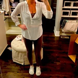 Brand new tags on white blouse. Long. Great condition.